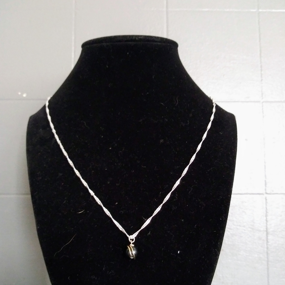 Freshwater Cultured pearl set on Sterling silver.